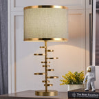 Gold Stacked Disc Table Lamp, White Drum Shade with Gold Trim