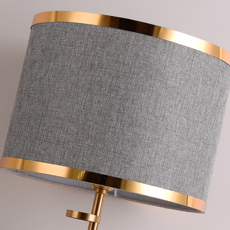 Gold Stacked Disc Table Lamp, White Drum Shade with Gold Trim