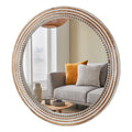 Beaded round wall mirror in whitewashed natural finish on a plain white background