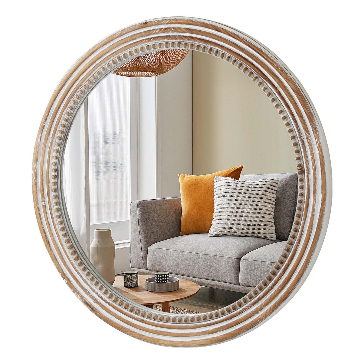 Beaded round wall mirror in whitewashed natural finish on a plain white background