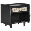 Black nightstand with cane drawer front and open shelf, three-quarter view on a white background