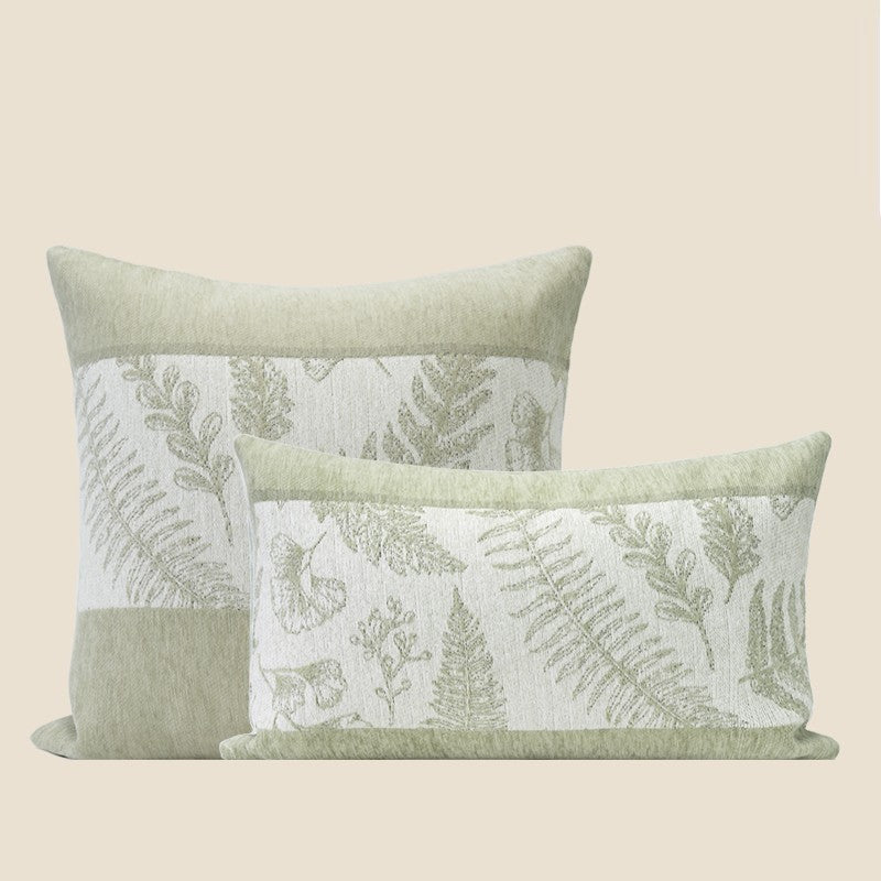 Square and lumbar sage fern chenille pillow covers together on a warm beige background