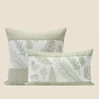 Square and lumbar sage fern chenille pillow covers together on a warm beige background