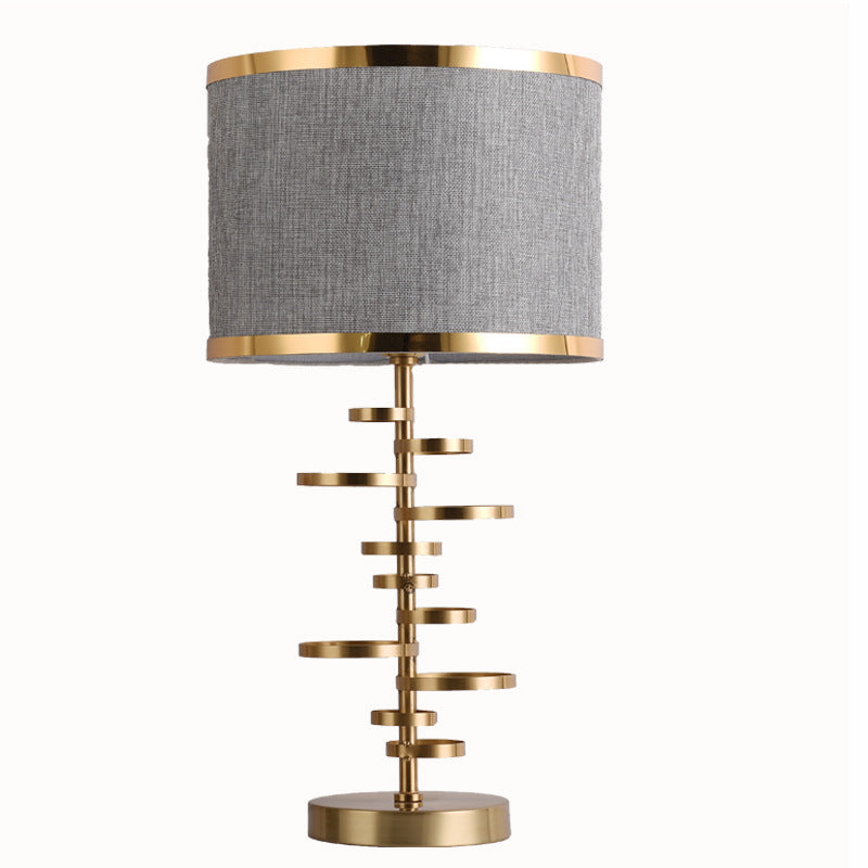 Gold Stacked Disc Table Lamp, White Drum Shade with Gold Trim