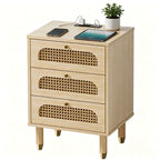 Cane-front three-drawer nightstand in natural oak finish with brass-tone knobs on a plain white background