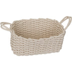 Large ivory cotton rope storage basket with two loop handles on a plain white background