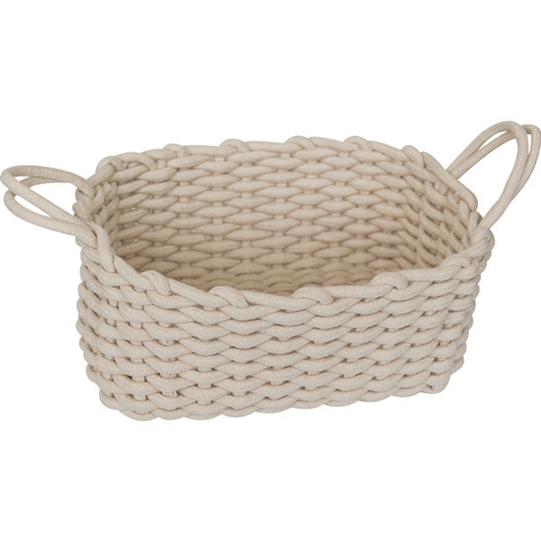 Large ivory cotton rope storage basket with two loop handles on a plain white background