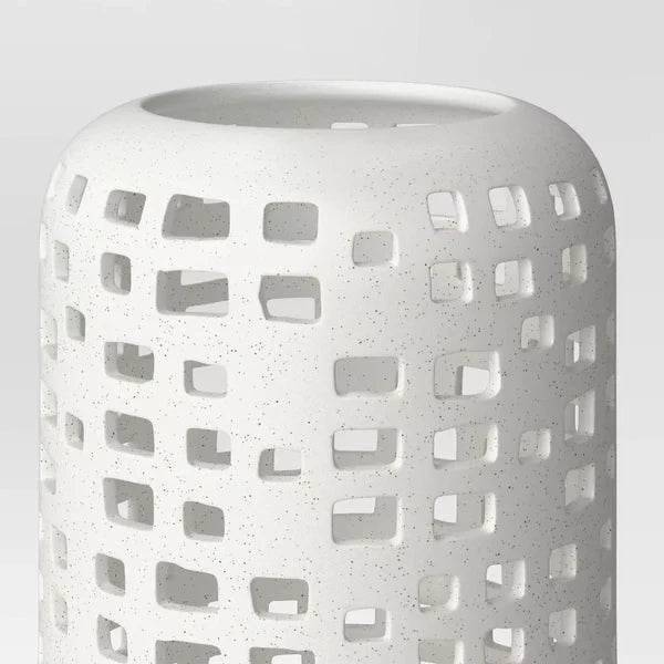 Cutout ceramic lantern — detail of the open top and rows of square cutouts