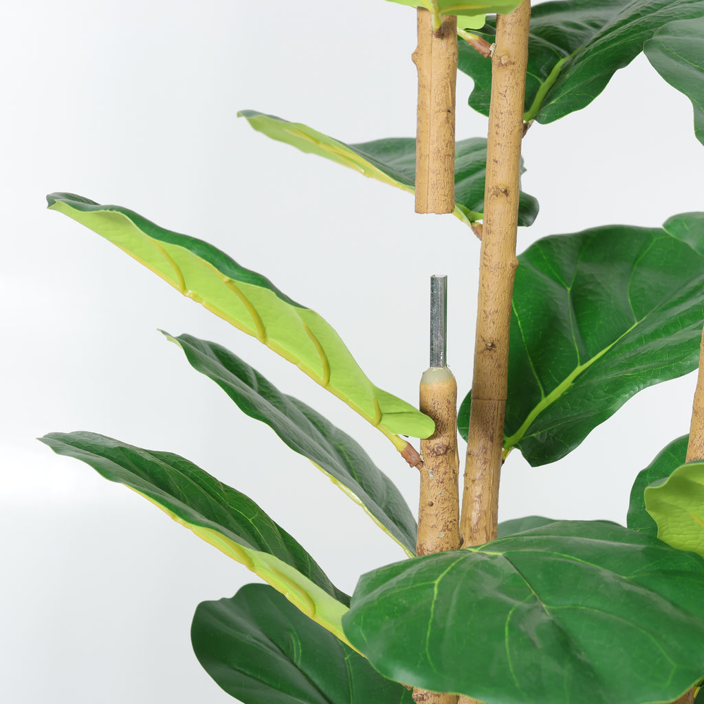Faux fiddle leaf fig tree — detail of the metal pin joining two trunk sections