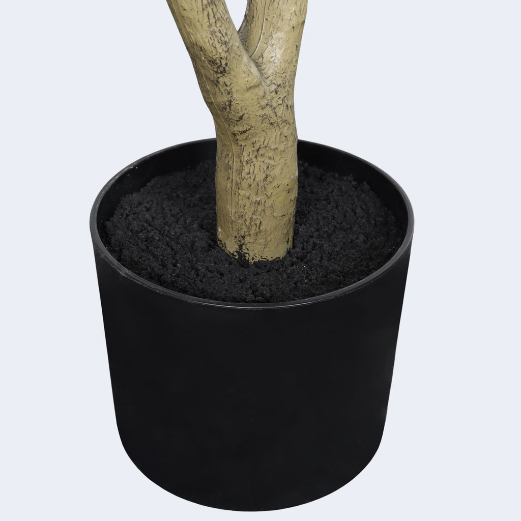 Faux olive tree — detail of the bark-textured trunk in its black plastic pot