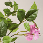 Faux pink bougainvillea tree — detail of the pink flowers and green leaves