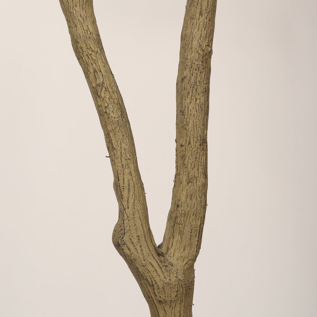 Faux pink bougainvillea tree — detail of the forked, bark-textured trunk
