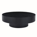 Fluted round drum coffee table in matte black on a plain white background