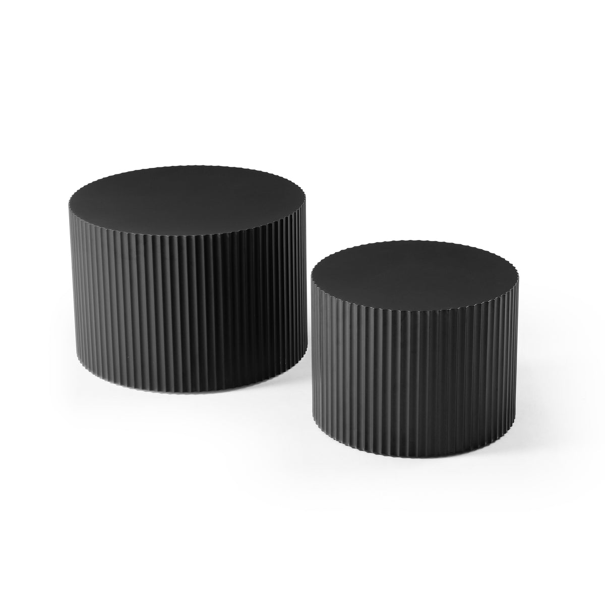 Fluted round nesting coffee tables in matte black, set of 2, on a plain white background