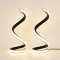 2Pcs Creative Spiral Three-Color Adjustable LED Desk Lamp on a warm cream background