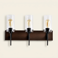 3-Light Matte Black Wood Color Bathroom Light Fixtures on a warm cream background