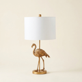 26 Matte Gold Flamingo Resin Table Lamp on a warm cream background