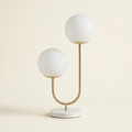 Metal 2-Light Globe Table Lamp on a warm cream background