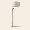 Horizon Brushed Nickel Table Lamp With On Off Switch Curved Metal Base on a warm cream background