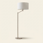 Horizon Brushed Nickel Table Lamp With On Off Switch Curved Metal Base on a warm cream background