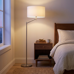 Horizon Brushed Nickel Table Lamp With On Off Switch Curved Metal Base styled in a warm modern interior
