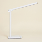 LED Desk Lamp 360 Adjustable on a warm cream background