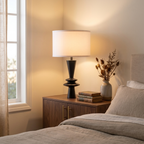 D15x26.7 Black Aluminum Table Lamp With Two Varying Round Accents And styled in a warm modern interior