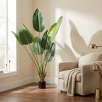 Artificial Birds Of Paradise Tree styled in a warm modern interior