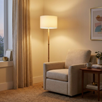 Brass Metal Tube Floor Lamp, Rattan Details, White Linen Shade, Gold Finish styled in a room