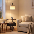 Farmhouse Metal Floor Lamp with End Table, Storage Shelf, Built-In Charging, Black Finish styled in a room