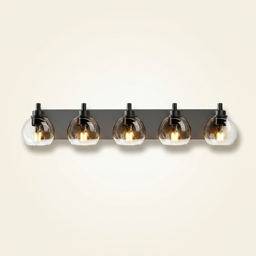 5-Light Bathroom Vanity Light, Clear Glass Globe Shades over Mirror, Matte Black, for Bathroom on a warm cream background