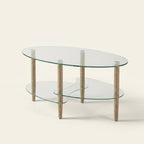 Three-Tier Oval Glass Coffee Table with Oak Legs on a warm cream background
