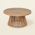 Acacia Wood Outdoor Coffee Table on a warm cream background