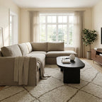 Modern Oval Coffee Table, Matte Black styled in a warm modern interior