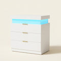LED Nightstand with Charging Station and Sliding Top, White on a warm cream background
