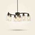 9-Light Black Iron Chandelier with Clear Glass Shades, 30 in on a warm cream background