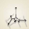 Modern Black Iron Branch Chandelier, 6 to 18 Lights on a warm cream background