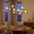 10-Light Tree Branch Chandelier, Wabi-Sabi Resin, Warm LED styled in a warm modern interior