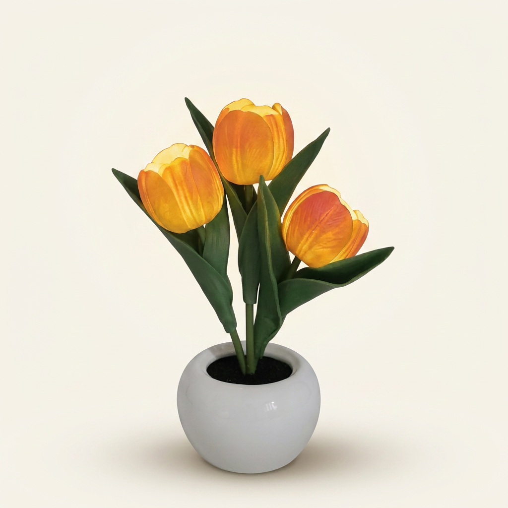 Orange tulip LED table lamp with white ceramic vase on a warm cream background