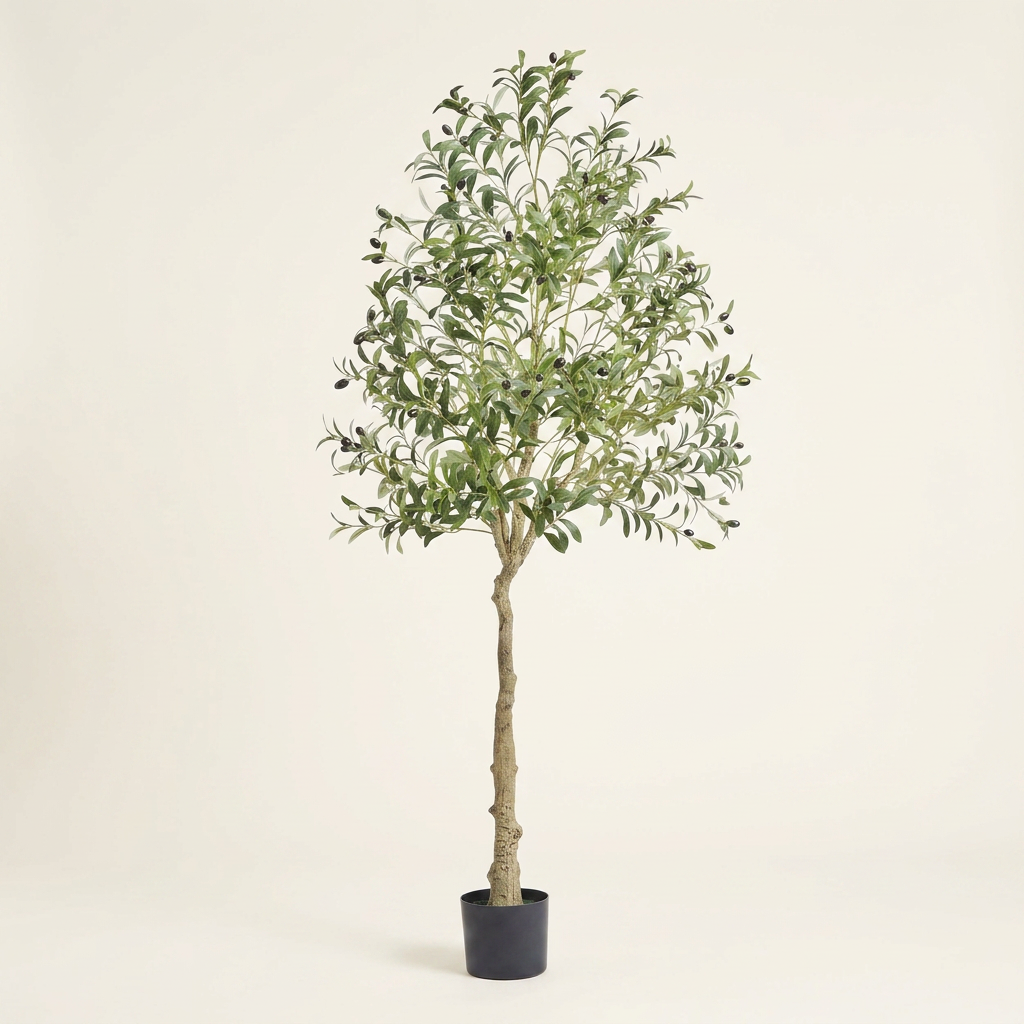 Artificial olive tree, faux potted greenery floor plant, on a warm cream background