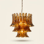 Three-Tier Iron & Glass Chandelier, Electroplated Finish on a warm cream background