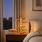 Gold Stacked Disc Table Lamp, White Drum Shade with Gold Trim styled in a warm modern interior