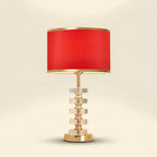 Stacked Crystal Table Lamp, Drum Shade with Gold Trim, 17 Inch on a warm cream background