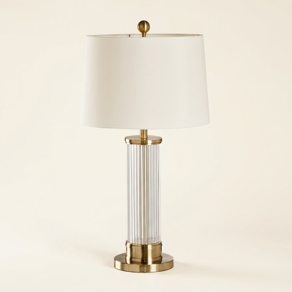 Fluted Glass Column Table Lamp, Brass Base, Tapered Shade on a warm cream background