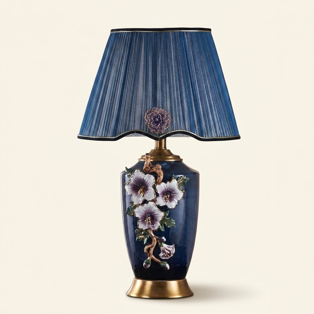Enamel Ceramic Table Lamp, Floral Relief, Pleated Shade on a warm cream background