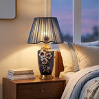 Enamel Ceramic Table Lamp, Floral Relief, Pleated Shade styled in a warm modern interior
