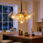 Modern 3-Light Glass Bubble Ball Pendant, 9 Clear Spheres styled in a warm modern interior