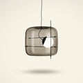 Art Glass Bedside Pendant Light, Smoke Gray, Clear or Cognac on a warm cream background