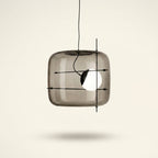 Art Glass Bedside Pendant Light, Smoke Gray, Clear or Cognac on a warm cream background