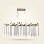 Cascading Crystal Pendant Light, 39 In. Gold Iron Frame on a warm cream background